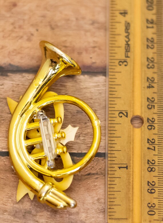 Vintage Ribbon Trumpet Gold Tone Christmas Plasti… - image 2