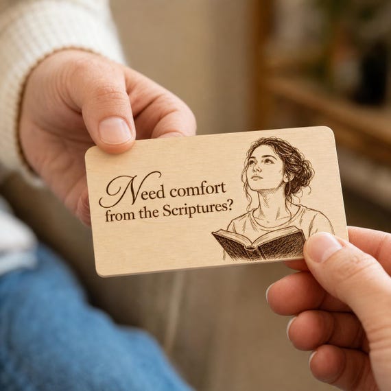 Quiet Harbor Comfort Contact Card being passed between two people in a close-up indoor scene.