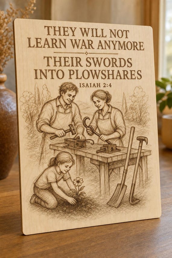 Natural birch engraved No More War Garden Tools wall sign with visible-faced illustrated people, close angled view in a realistic room showing the thin finished edge.