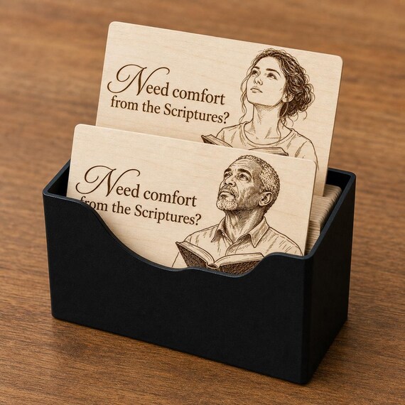 Quiet Harbor Comfort Contact Cards displayed close up in a matte black notched card case.