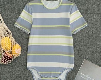 May include: A white and blue striped bodysuit with a green chevron pattern. The bodysuit has short sleeves and a round neckline.