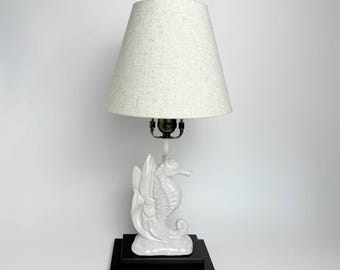 White Ceramic Coastal Seahorse Table Lamp with Wooden Base. Included Lamp Shade