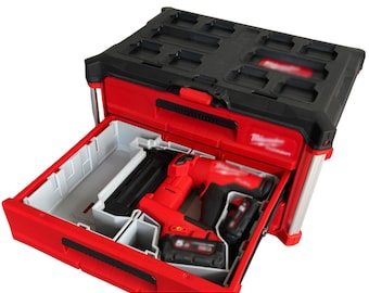 May include: Red and black tool box with a removable tray. The tray contains a red and black power tool with a battery.