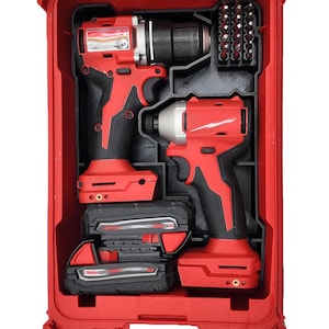 May include: A red and black power tool kit, featuring a drill, impact driver, and various drill bits. The tools are neatly organized within a red carrying case, along with two battery packs. The tools have a black and red color scheme.