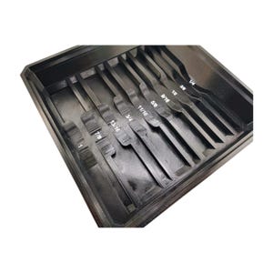 Puede incluir: Un organizador de herramientas negro, impreso en 3D, con m&uacute;ltiples ranuras. El organizador est&aacute; dise&ntilde;ado para guardar varias herramientas, con medidas como 1/4, 3/8, 1/2, 5/8, 9/16, 11/16, 3/4, 13/16, 7/8 y 1 pulgada claramente etiquetadas.