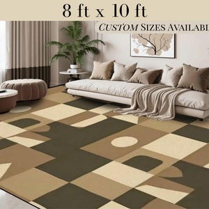 May include: A geometric patterned area rug in shades of brown and beige. The rug is 8 feet by 10 feet and is shown in a living room setting with a couch and a coffee table. Custom sizes are available.