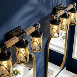 Three Light Vanity Fixture Art Deco Bathroom Wall Sconce Lighting Above Sink Mirror Vintage Style Gold Black Metal Glass Wood Accent Powder Room Home Lighting Modern Bath Fixture Elegant Luxe Statement Warm Ambient Glow Bathroom Upgrade