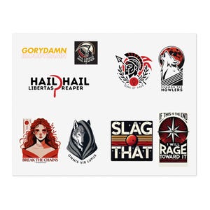 May include: A set of nine stickers featuring various graphic designs. The stickers feature a wolf, a skull, a woman, a sword, a star, and a red planet. The stickers are all in black, white, and red.