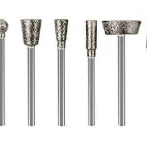May include: Set of seven diamond-tipped rotary tool bits for grinding, carving, and polishing. The bits are made of high-quality materials and are designed for long-lasting use.