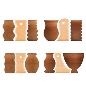 May include: Set of four wooden tools for pottery and ceramics. The tools are shaped like a wavy line, a flat paddle, a ribbed roller, and a curved scraper. The tools are made of light brown wood and are arranged in two rows of two.