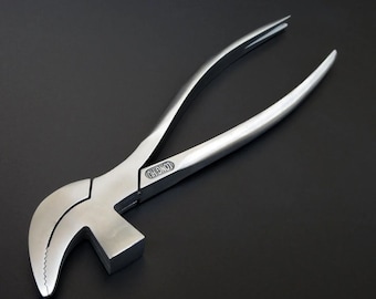 May include: Silver metal pliers with a hammer head on one end. The pliers are labeled "LONG-RU".