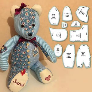 May include: A sewing pattern for a patchwork teddy bear. The pattern includes pieces for the head, body, arms, legs, ears, and feet. The pattern is printed on white paper with blue and green accents.