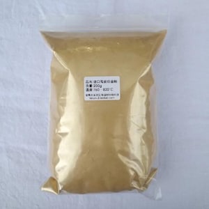 May include: A resealable plastic bag filled with a golden yellow powder. The bag has a label that reads "天然 口腔 保健 食品", "含量 200g", "温度 760 - 820℃", and "taoyin-2.taobao.com".