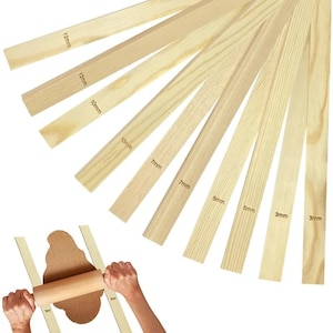 May include: Assortment of wooden strips in various sizes, ranging from 3mm to 12mm in width. The strips are natural wood color and have the width measurement printed on each strip.