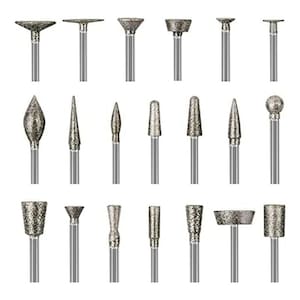 Peut inclure: Un ensemble de 20 outils rotatifs à pointe diamantée pour le meulage, la sculpture et le polissage. Les outils sont fabriqués avec des matériaux de haute qualité et sont conçus pour être utilisés avec un outil rotatif.