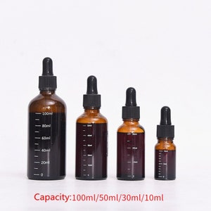May include: Four amber glass bottles with black dropper tops and graduated markings. The bottles are labeled with the following capacities: 100ml, 50ml, 30ml, and 10ml.  Capacity: 100ml/50ml/30ml/10ml