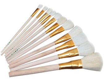 May include: A set of 10 paint brushes with white bristles and wooden handles. The brushes have gold ferrules and vary in size.