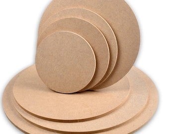May include: Set of five unfinished wood round circles, stacked in size order, with the largest circle at the bottom and the smallest circle at the top.