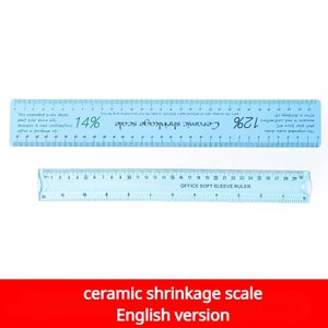 May include: A blue plastic ruler with a ceramic shrinkage scale. The ruler has markings for 12% and 14% shrinkage. The ruler also has a soft sleeve and the text "OFFICE SOFT SLEEVE RULER". The ruler is labeled "ceramic shrinkage scale English version".