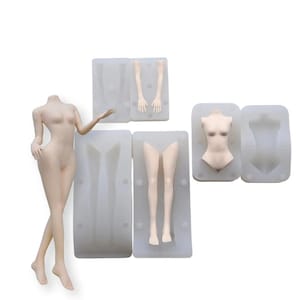 May include: A nude-coloured, articulated doll stands beside several silicone moulds. The moulds are in the shape of doll body parts, including arms, legs, and a torso. The moulds are white and rectangular.