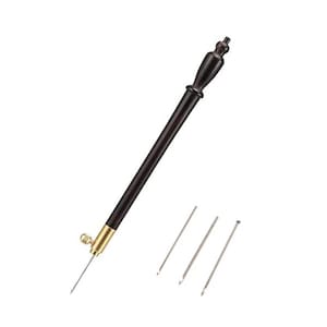 May include: A dark brown punch needle tool with a brass fitting and a wooden handle. Three replacement needles are included. The tool is designed for rug hooking and embroidery projects.