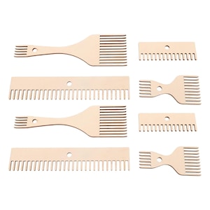 May include: A collection of eight light-coloured wooden weaving combs arranged in two columns. The set includes four rectangular combs with teeth on one side and four shaped combs with teeth on both ends, each featuring a small circular hole in the centre.