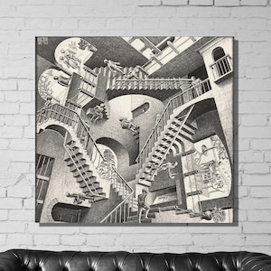 May include: A black and white lithograph print of a surrealist staircase design by M.C. Escher. The print depicts a series of staircases that appear to go both up and down at the same time, creating a sense of optical illusion.