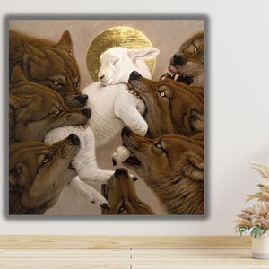 May include: A square wall art print depicting a white lamb with a golden halo behind its head, surrounded by several brown wolves. The wolves are shown with their mouths open near the lamb, which has its eyes closed against a neutral background.