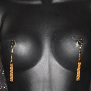 Nipples jewelry non piercing. Foreplay nipple toys. Mature.