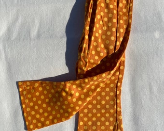 5 years - Vintage 70s elasticated waist flared trousers in orange with yellow polka dots print