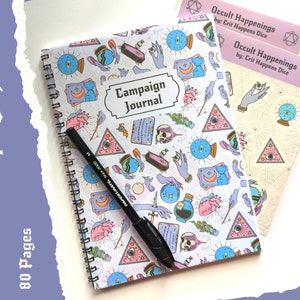 May include: A white spiral bound journal with a colourful pattern of eyes, hands, and other occult symbols. The cover says "Campaign Journal". The journal is accompanied by two sheets of stickers with occult symbols and the text "Occult Happenings by: Crit Happens Dice".