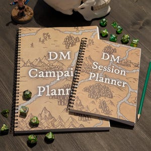 May include: Two spiral bound notebooks with brown paper covers and a map design. The top notebook says "DM Campaign Planner" and the bottom notebook says "DM Session Planner".
