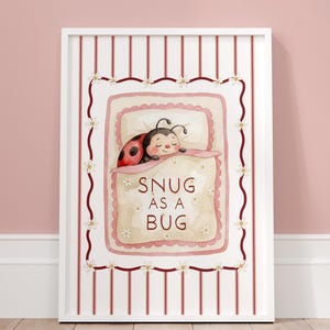 Snug as a Bug nursery wall art, unframed baby girl print with cute ladybird illustration, pink striped background and floral details for nursery decor
