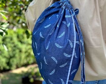 Mochila vaquera ligera: Bolsa reflectante con cordón ajustable