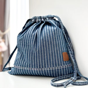 small canvas blue stripe drawstring bag