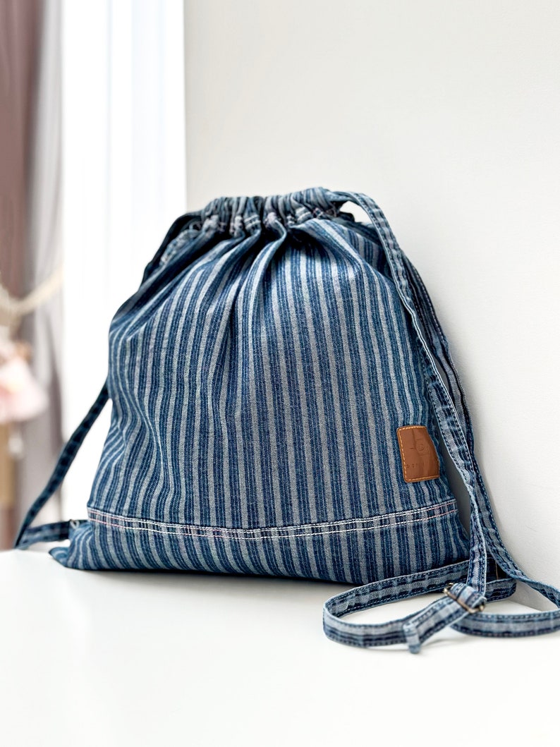 small canvas blue stripe drawstring bag