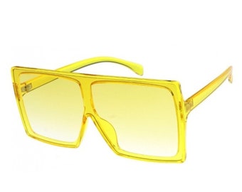 Stora solglasögon med fyrkantiga bågar – redo för vårlovet