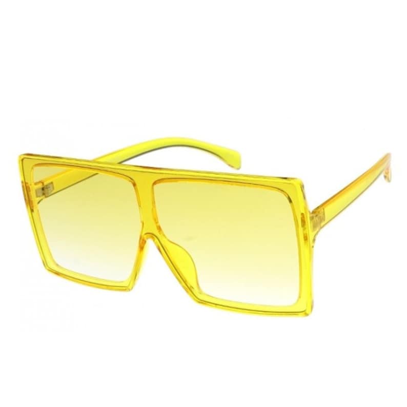 Puede incluir: Gafas de sol cuadradas amarillas con montura amarilla y lentes amarillas.