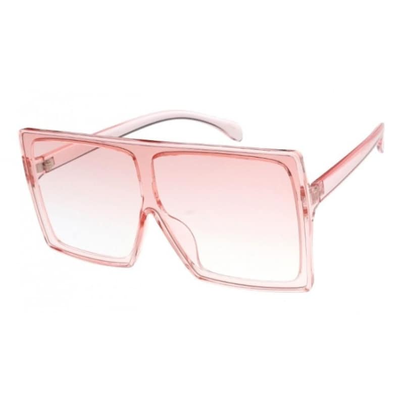Puede incluir: Gafas de sol cuadradas de color rosa con lentes degradados. Las gafas tienen un marco transparente.
