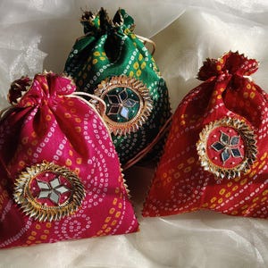 RN traditional Bandhej Potli decorated with Gota patti patch for give aways for weddings, sangeet, Teej etc ( size -  7 x 9 inches )