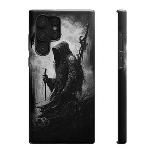 May include: Black phone case featuring a hooded figure with a staff and a large weapon, set against a dark, atmospheric background. The design is a monochrome illustration with a gothic theme.