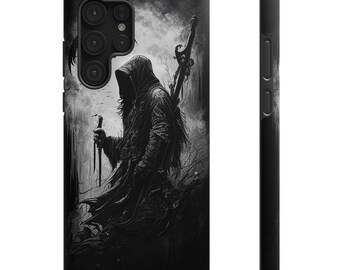 May include: Black phone case with a monochrome illustration of a hooded figure holding a staff and a large weapon. The design has a gothic theme and is set against a dark, atmospheric background.