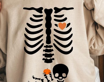 Skeleton Halloween Maternity Shirt, Funny Pregnancy Announcement 2025 Sweatshirt Spooky Pregnant Costume New Mommy Tee, Fall Mama to Be Gift