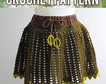 May include: A crochet skirt with a brown waistband and green crocheted details. The skirt has a lace-like pattern and a scalloped hem.