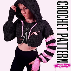 May include: A black crochet hoodie with distressed details, featuring pink accents and a silver chain. The sleeves are striped black and pink. The text "CROCHET PATTERN" is visible.
