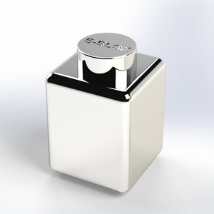May include: A silver metal bottle stopper with the text "E-BLOX" on the top.
