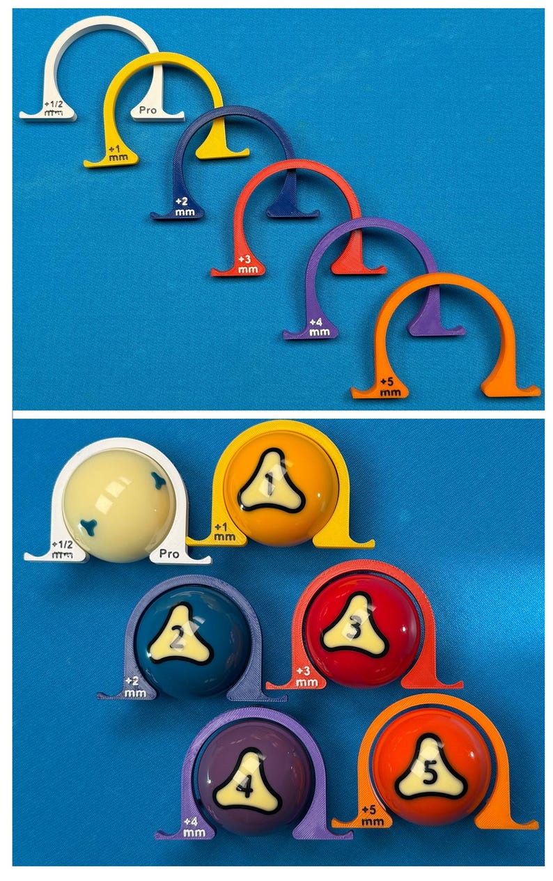 May include: A collection of billiard ball measuring tools in various colors, including white, yellow, blue, red, purple, and orange. Each tool is labeled with a millimeter measurement and a number from 1 to 5. The balls are also numbered.