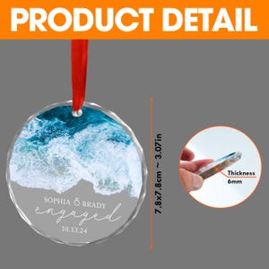 May include: Round glass ornament with a photo of ocean waves and the text "Sophia & Brady engaged 10.13.24". The ornament is 7.8 inches in diameter and 0.6 inches thick.