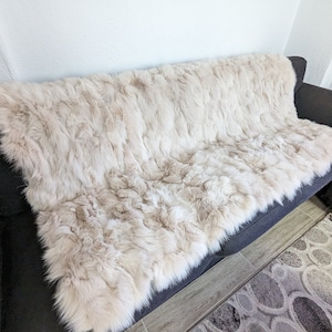 Fox fur blanket throw, light peach color, real soft and warm fur cover, home decoration cozy fur bedsheets.