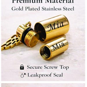 May include: Gold-plated stainless steel cremation urn with the name "Mia" engraved on the side. The urn has a secure screw top and a leakproof seal. The urn is open, revealing the interior.